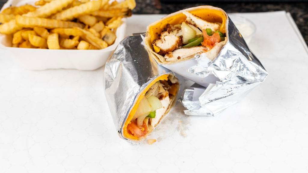 Chicken Souvlaki Wrap · Grilled chicken, peppers onions tomatoes and cheddar cheese served on a pita