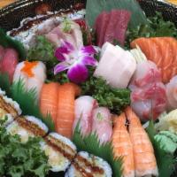 Love Boat For 2 · Ten pieces sushi, eighteen  pieces sashimi, shrimp tempura roll and eel roll.