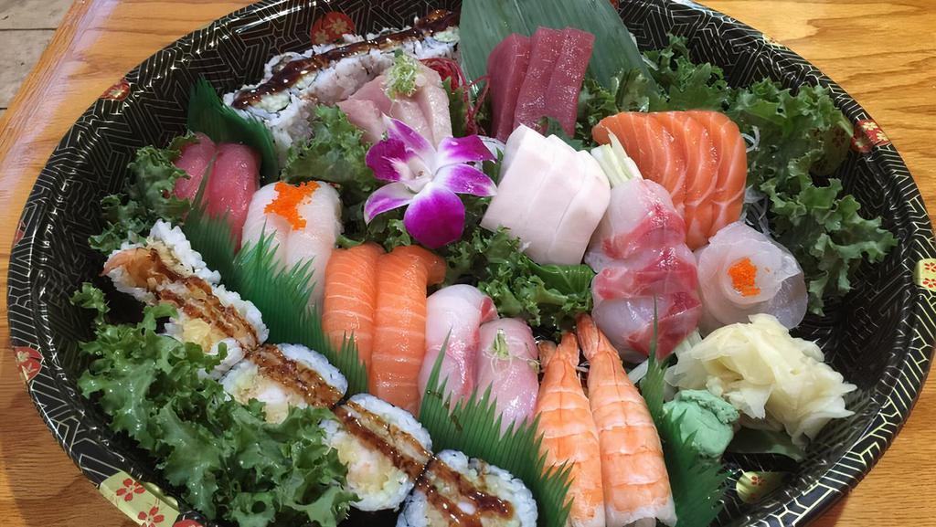 Love Boat For 2 · Ten pieces sushi, eighteen  pieces sashimi, shrimp tempura roll and eel roll.