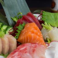 Sashimi Regular · Fifteen pieces sashimi and rice.