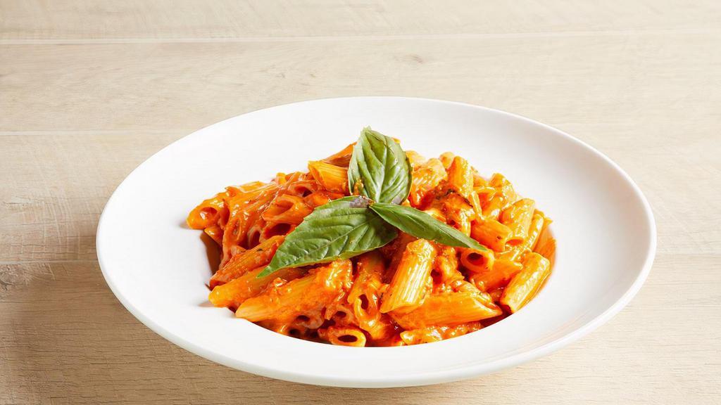 Pasta With Vodka Sauce · A Tomato Cream Sauce with a Hint of Vodka. Served with Your Choice of Pasta & Toppings