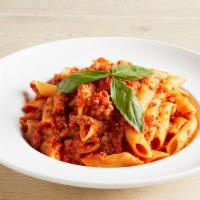 Pasta With Meat Sauce · A Hearty Seasoned Ground Beef Tomato Sauce. Served with Your Choice of Pasta & Toppings