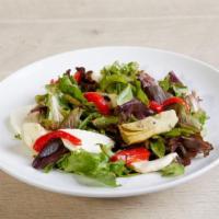 Mario’S  Salad · Mixed Greens, Roasted Red Peppers, Artichoke Hearts, Tomatoes & Fresh Mozzarella Cheese. Ser...