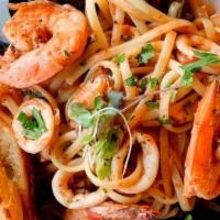 Seafood Pasta · Linguine pasta, shrimp, mussels, calamari, white wine, light tomato sauce