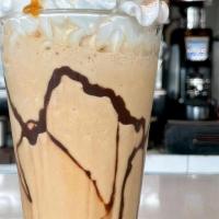 Cool Caramel Frappeccino · TRU Favorite! Cold creamy blend of Ghiradelli caramel and white chocolate topped with a dalu...