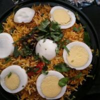Hyderabadi Mutton Dum Biryani · Spice marinated mutton and basmati rice, layered and slow cooked over low flame.