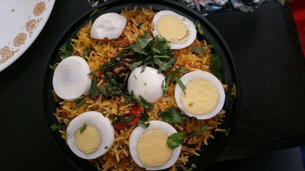 Hyderabadi Mutton Dum Biryani · Spice marinated mutton and basmati rice, layered and slow cooked over low flame.