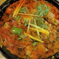 Kadai Chicken · Country style chicken cubes with diced onion, bell peppers and sliced long hot chillies in a...