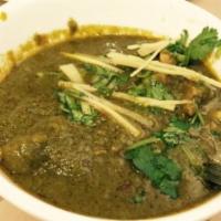 Chicken Hara Masala · Chicken cooked in a special green sauce with fresh herbs.