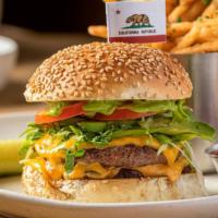 Upland Cheeseburger · grass fed beef, american cheese, peppadew peppers + avocado.  served with fries.
