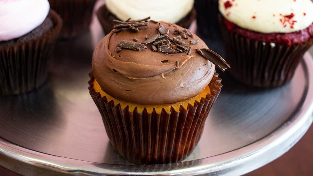 Vanilla N Chocolate Cupcake · A vanilla cake topped with our signature chocolate buttercream.