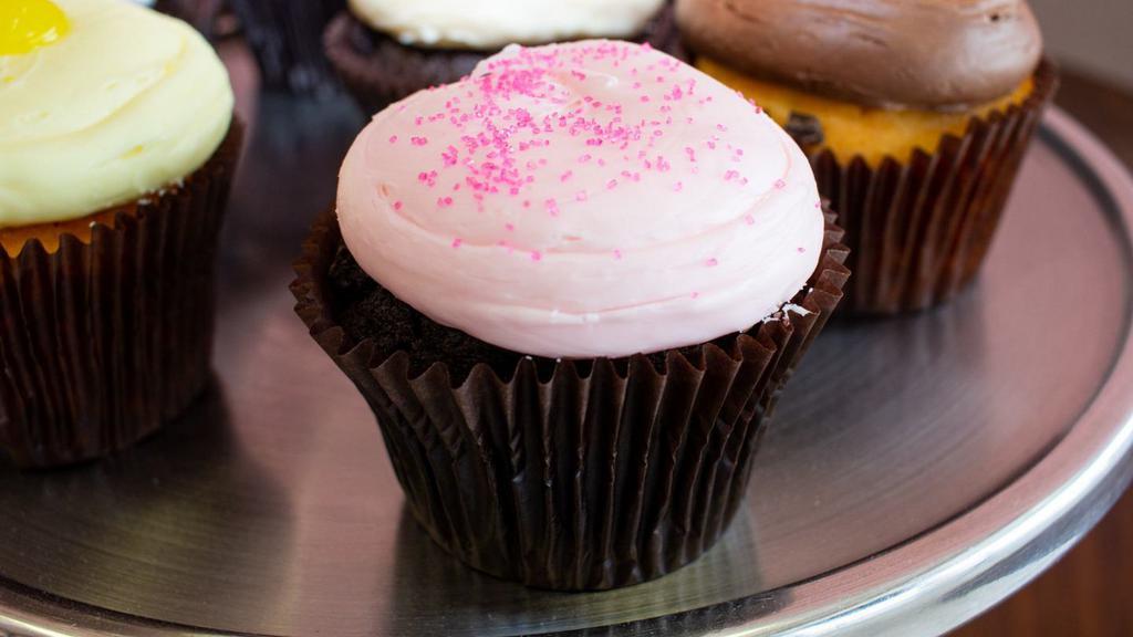 Pink Chocolate · Chocolate cake with our signature pink buttercream frosting.