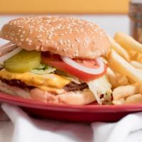 Original Cheeseburger Combo · Served with lettuce, tomato, onion, pickles, ketchup and yellow american cheese. Included me...