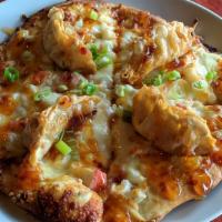 Crab Rangoon Personal Pizza · Sweet crab meat mixed with cream cheese and topped with mozzarella then baked and finished w...