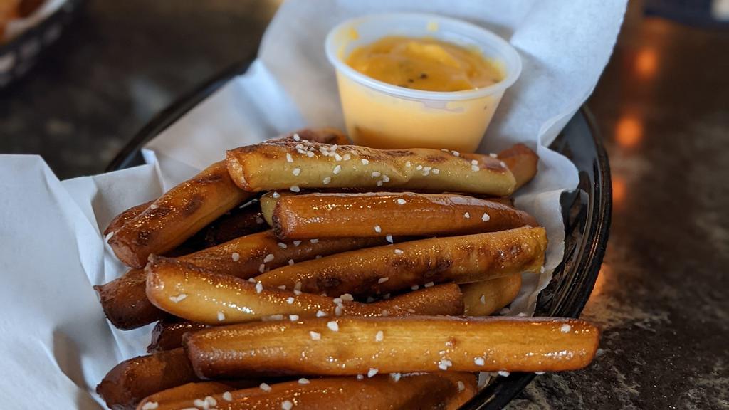 Pretzel Fries · Served with our homemade cheese sauce, perfect for dipping