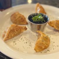 Pot Stickers · Chicken teriyaki pot stickers served with house Korean BBQ sauce