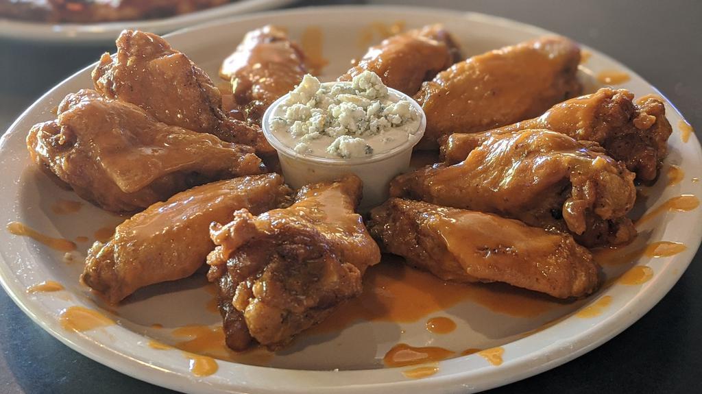 10 Stone Wings · Ten extra crisp twice fried wings, tossed in your choice of sauce
