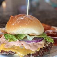 Super Smashburger · The 1/2 lb steak burger smashed down into a huge 6