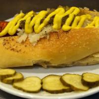 The Veggie Dog · Large carrot poached in our special marinade, grilled then finished with choice of toppings ...