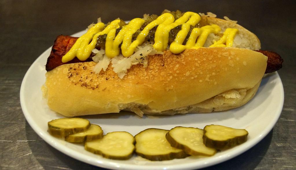 The Veggie Dog · Large carrot poached in our special marinade, grilled then finished with choice of toppings and a side