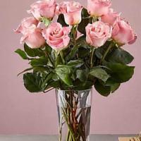 12 Long Stem Pink Roses · Enjoy the classic Beauty of the rose with a playful twist in our Long Stem Pink Rose Bouquet...