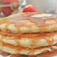 Buttermilk Pancake Stack (3 Pcs) · Fluffy, buttery, light, classic buttermilk pancakes. Served with real butter and maple syrup.