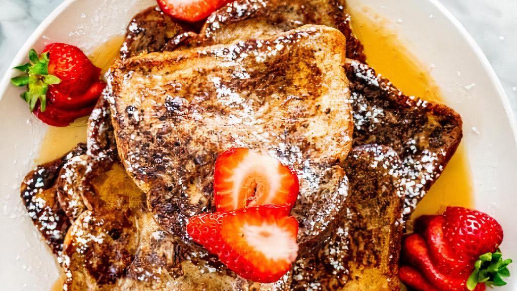 Classic French Toast (2 Pcs) · Rich, thick, custardy French toast slices, griddled to browned perfection. Served with real butter and maple syrup.