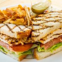 Grilled Chicken Sandwich · on grilled sourdough, with avocado, bacon, chipotle mayo, romaine and beefsteak tomato . Ser...