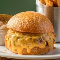 Clinton St. Cheeseburger · With Swiss or cheddar and caramelized sweet onions on a toasted clinton st. Kaiser bun. Serv...