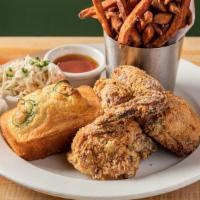 Buttermilk Fried Chicken Dinner · with honey-Tabasco sauce, house slaw, jalapeño cornbread and choice of one side