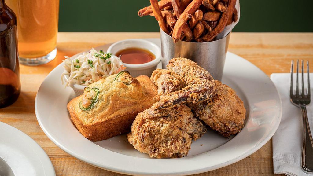 Buttermilk Fried Chicken Dinner · with honey-Tabasco sauce, house slaw, jalapeño cornbread and choice of one side
