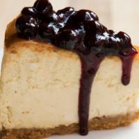 Blueberry Cheesecake · Classic New York style and graham cracker crust with clinton st. Blueberry sauce.