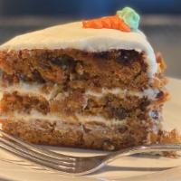 Carrot Cake · House recipe, toasted walnuts, golden raisins, cream cheese frosting