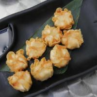 Shumai (Shrimp And Pork) · Fried or steamed shrimp and pork stuffed dumplings with house made gyoza sauce (8 pieces)