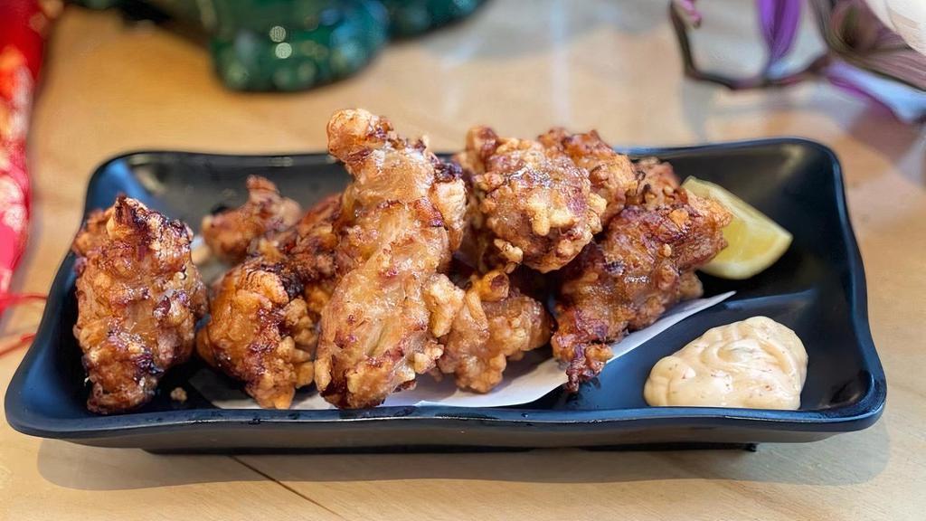 Chicken Karaage · Deep fried Japanese style chicken thigh, with lemon and spicy aioli sauce on the side