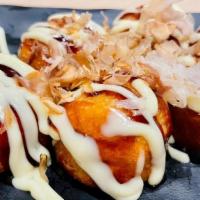 Takoyaki · Fried Japanese octopus balls, topped with house made sauce, Japanese mayo, aonori and bonito...