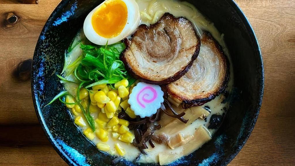 Miso Ramen · Chashu pork belly (2 pcs), minced pork, half cooked egg, bamboo shoots, corn, leek, cabbage, fish cake in miso tonkotsu broth ***Contains Sesame***
