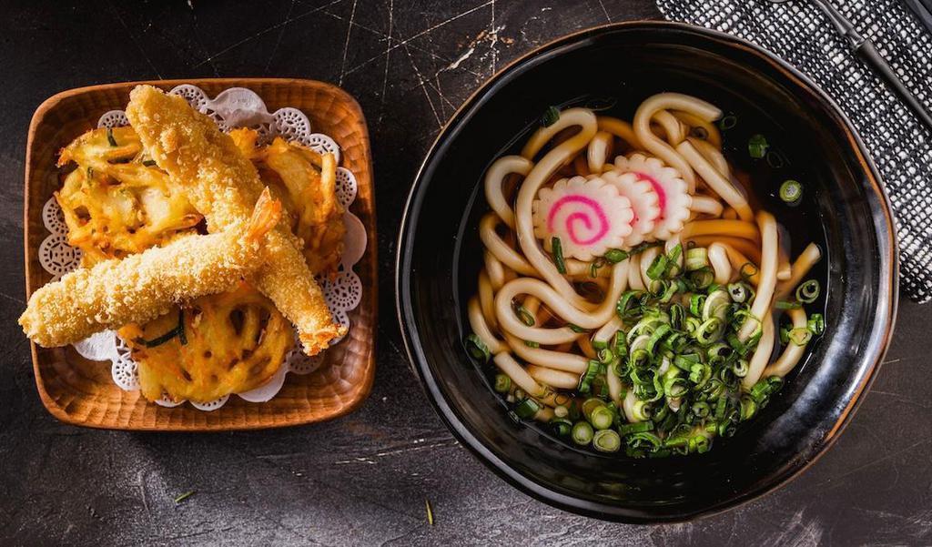 Shrimp Tempura Udon · Udon noodles, fish cake, green onions in shoyu bonito broth served with shrimp and vegetable tempura