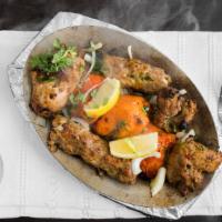 Shahi Platter · Two pieces of hiryali, mali, boti tikka, one kebab, and one tandoori leg.