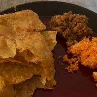Halwa Puri · Fried crunchy poori and special halwa by our chef with chickpea gravy, aloo bhujia cooked in...