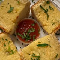 Garlic Bread Fresh From Our Brick Oven · 