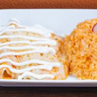 Enchiladas Suizas · Three soft corn tortillas with your choice of chicken, beef or cheese, topped with green tom...