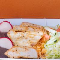 Pollo A La Plancha · Servidos con arroz frijoles y ensalada, grilled chicken, served with rice beans and salad.