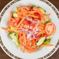 Garden Salad · Lettuce, tomato, onions, and cucumbers.