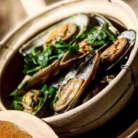 Mussels Thai Curry · Comes with roasted baguette.