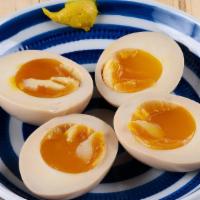 Aji Tamago · Soft boiled egg marinated in soy sauce.