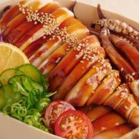 Ika Teriyaki Don · Grilled whole squid with teriyaki sauce over Japanese rice, pickle.