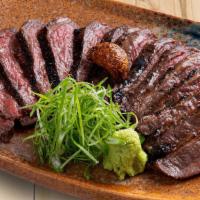 Garlic Soy Skirt Steak · Grilled skirt steak marinated with soy sauce and sake.