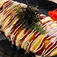 Omu Yakisoba · Pan-fried egg noodles wrapped in omelette and vegetable with mayonnaise yakisoba sauce.