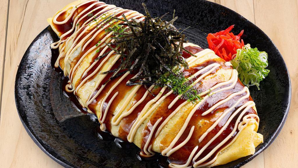 Omu Yakisoba · Pan-fried egg noodles wrapped in omelette and vegetable with mayonnaise yakisoba sauce.